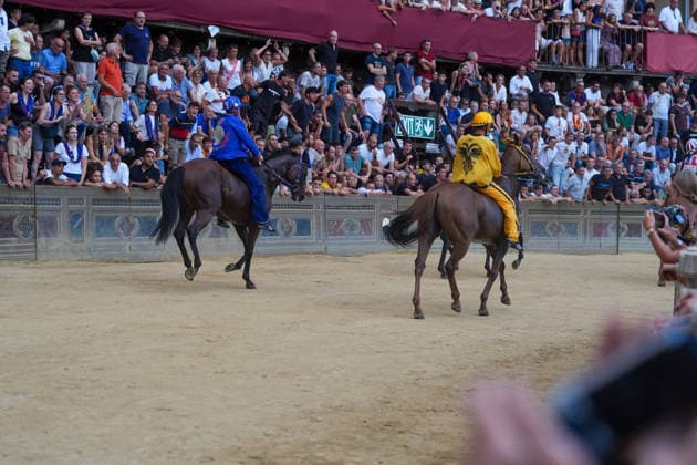 August 18, 2026, Siena, Toscana, italia: The Nicchio Contrada wins the Palio with the horse Teodoro and jockey Giovanni Atzeni, known as Tittia, during the Siena Palio held on August 18, 2026, in Siena s Piazza del Campo. Palio Of Siena Of August 18, 2026  - ZUMAs236 20260818_aap_s236_014 Copyright: xFabioxSassox