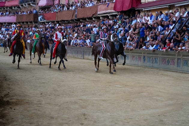 August 18, 2026, Siena, Toscana, italia: The Nicchio Contrada wins the Palio with the horse Teodoro and jockey Giovanni Atzeni, known as Tittia, during the Siena Palio held on August 18, 2026, in Siena s Piazza del Campo. Palio Of Siena Of August 18, 2026  - ZUMAs236 20260818_aap_s236_016 Copyright: xFabioxSassox