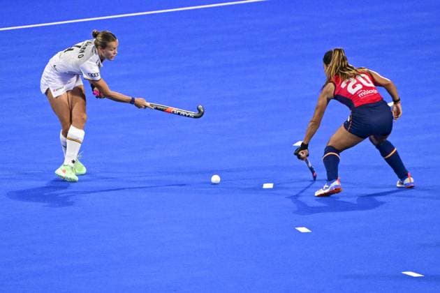 Belgium s Delphine Marien and Spanish Xantal Gine pictured during a Field hockey, Feldhockey game between Belgian national team, Nationalteam Red Panthers and Spain during the group stage of the women s 2026 Hockey World Cup, on Tuesday 18 August 2026, in Wavre. The 2026 edition of the Hockey World Cup takes place in Belgium and The Netherlands from August 15 to August 30. DIRKxWAEM  x183713960x