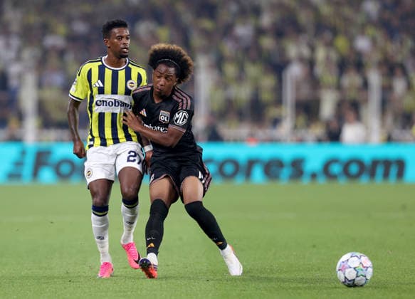 Fenerbahce v Olympique Lyonnais - UEFA Champions League ISTANBUL, TURKIYE - AUGUST 18: Nelson Semedo (27) of Fenerbahce in action against Fofana (R) of Olympique Lyonnais during the UEFA Champions League play-off round first leg match between Fenerbahce and Olympique Lyonnais at Chobani Stadium in Istanbul, Turkiye on August 18, 2026. Ali Atmaca Anadolu Istanbul Turkey. Editorial use only. Please get in touch for any other usage.  Copyright: x2026xAnadoluxAlixAtmacax