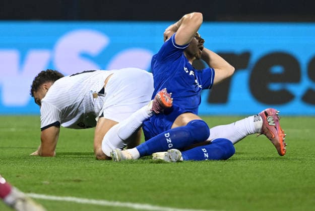 GNK Dinamo Zagreb v Viking - UEFA Champions League 2026 27 Play-Offs First Leg Gianni Stensness of Viking and Miha Zajc of GNK Dinamo Zagreb during the UEFA Champions League 2026 27 play-offs first leg match between GNK Dinamo Zagreb and Viking at Maksimir Stadium on August 18, 2026 in Zagreb, Croatia.  MarkoxLukunic PIXSELL