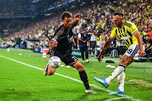 Fenerbahce v Olympique Lyonnais - UEFA Champions League ISTANBUL, TURKIYE - AUGUST 18: Vedat Muriqi of Fenerbahce in action against Ruben Kluivert (L) of Olympique Lyonnais during the UEFA Champions League play-off round first-leg match between Fenerbahce and Olympique Lyonnais at Chobani Stadium on August 18, 2026, in Istanbul, Turkiye. Cem Tekkesinoglu Anadolu Istanbul Turkey. Editorial use only. Please get in touch for any other usage.  Copyright: x2026xAnadoluxCemxTekkesinoglux