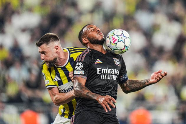 Fenerbahce v Olympique Lyonnais - UEFA Champions League ISTANBUL, TURKIYE - AUGUST 18: Milan Skriniar of Fenerbahce in action against Corentin Tolisso of Olympique Lyonnais during the UEFA Champions League play-off round first-leg match between Fenerbahce and Olympique Lyonnais at Chobani Stadium on August 18, 2026, in Istanbul, Turkiye. Cemal Yurttas Anadolu Istanbul Turkey. Editorial use only. Please get in touch for any other usage.  Copyright: x2026xAnadoluxCemalxYurttasx