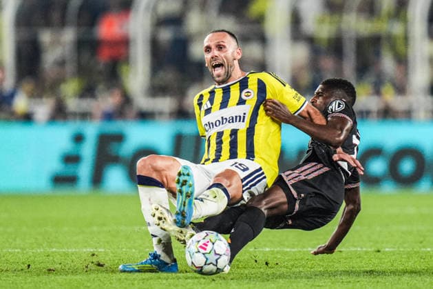 Fenerbahce v Olympique Lyonnais - UEFA Champions League ISTANBUL, TURKIYE - AUGUST 18: Vedat Muric of Fenerbahce in action against Clinton Mata of Olympique Lyonnais during the UEFA Champions League play-off round first-leg match between Fenerbahce and Olympique Lyonnais at Chobani Stadium on August 18, 2026, in Istanbul, Turkiye. Cemal Yurttas Anadolu Istanbul Turkey. Editorial use only. Please get in touch for any other usage.  Copyright: x2026xAnadoluxCemalxYurttasx