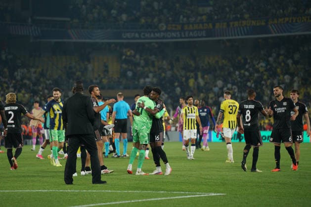August 19, 2026, Kadikoy, Istanbul, Turkey: Ederson (L) of Fenerbahce and Abner (R) of Olympique Lyonnais embrace after the UEFA Champions League play-off round match between Fenerbahce and Olympique Lyonnais at the Chobani Stadium, Fenerbahce Sukru Saracoglu Sports Complex in Istanbul, Turkey, on August 18, 2026. Kadikoy Turkey - ZUMAu194 20260819_zip_u194_011 Copyright: xTolgaxUluturkx