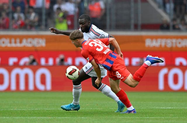 Kopfballduell Zweikampf Aktion Yannik Wagner 1. FC Heidenheim 1846 FCH (38) gegen Dayot Upamecano FC Bayern Muenchen FCB (02) 1. FC Heidenheim 1846 FCH vs FC Bayern Muenchen FCB TESTSPIEL 18.08.2026 DFL REGULATIONS PROHIBIT ANY USE OF PHOTOGRAPHS AS IMAGE SEQUENCES AND OR QUASI-VIDEO 1. FC Heidenheim 1846 FCH vs FC Bayern Muenchen FCB TESTSPIEL *** Heading duel, tackle, action: Yannik Wagner (1. FC Heidenheim 1846, FCH 38) vs. Dayot Upamecano (FC Bayern Munich, FCB 02); 1. FC Heidenheim 1846 (FCH) vs. FC Bayern Munich (FCB) – Friendly Match 18 08 2026 DFL REGULATIONS PROHIBIT ANY USE OF PHOTOGRAPHS AS IMAGE SEQUENCES AND OR QUASI-VIDEO 1 FC Heidenheim 1846 FCH vs. FC Bayern Munich FCB Friendly Match