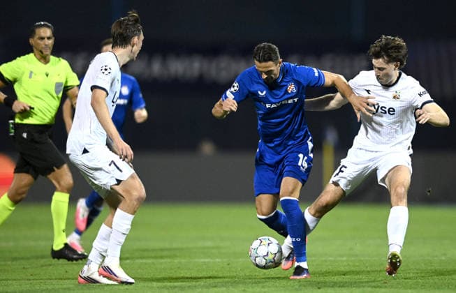 GNK Dinamo Zagreb v Viking - UEFA Champions League 2026 27 Play-Offs First Leg Smail Prevljak of GNK Dinamo Zagreb competes for the ball with Simen Kvia-Egeskog of Viking during the UEFA Champions League 2026 27 play-offs first leg match between GNK Dinamo Zagreb and Viking at Maksimir Stadium on August 18, 2026 in Zagreb, Croatia.  MarkoxLukunic PIXSELL