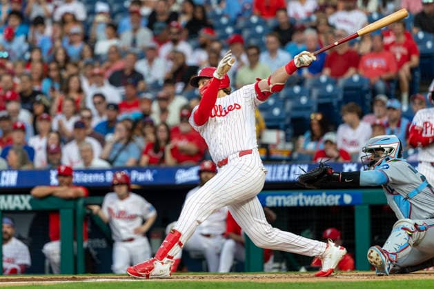 Philadelphia Phillies Alec Bohm hits an RBI single during the first inning of a baseball game against the Miami Marlins, Tuesday, Aug. 18, 2026, in Philadelphia, Pennsylvania. Bryce Harper scored.  PHI20260818001 LaurencexKesterson