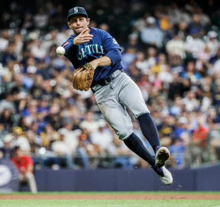 Seattle Mariners third baseman Brendan Donovan throws out Milwaukee Brewers center fielder Garrett Mitchell on a ground ball in the fourth inning of the MLB, Baseball Herren, USA game between the Seattle Mariners and the Milwaukee Brewers at American Family Field in Milwaukee, Wisconsin on Tuesday, August 18, 2026.  MIL20260818814 TANNENxMAURY