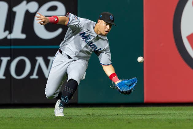 Miami Marlins left fielder Heriberto Hernández fields an RBI single from Philadelphia Phillies designated hitter Kyle Schwarber during the eighth inning of a baseball game, Tuesday, August 18, 2026, in Philadelphia, Pennsylvania.  PHI20260818020 LaurencexKesterson