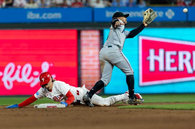 Philadelphia Phillies Bryson Stott is safe at second base before Miami Marlins second baseman Xavier Edwards can make the tag in the eighth inning of a baseball game, Tuesday, August 18, 2026, in Philadelphia, Pennsylvania.  PHI20260818021 LaurencexKesterson