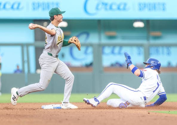 AUG 18, 2026: Kansas City Royals shortstop Bobby Witt Jr. (7) slides into second base as Athletics infielder Alika Williams (12) starts a double play at Kauffman Stadium Kansas City, MO. CSM MLB, Baseball Herren, USA 2026: Athletics Vs Royals Aug 18th  - ZUMAc04_ 20260818_zma_c04_164 Copyright: xRomanxPunox