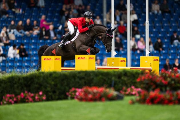 260819 Max Kuhner of Austria with horse EIC Cooley Jump the compete in the team and individual jumping qualifier round one during day 9 of the 2026 FEI World Championships on August 19, 2026 in Aachen. Photo: Emma Wallskog BILDBYRAN kod EW EW0689 ridsport equestrian rid-vm 2026 2026 fei world championships bbeng ridsport-vm hoppning jumping *** August 19, 2026: Max Kuhner of Austria, riding EIC Cooley Jump, competed in the first round of the team and individual show jumping qualifiers on Day 9 of the 2026 FEI World Championships in Aachen. 2026 in Aachen. Photo by Emma Wallskog. BILDBYRAN code EW EW0689. equestrian sports, 2026 World Championships, 2026 FEI World Championships, BBENG, equestrian sports, World Championships, show jumping  Copyright: EMMAxWALLSKOG BB260819EW027