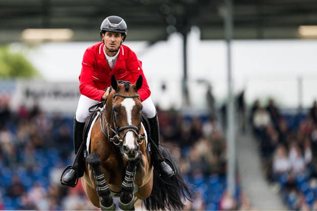 260819 Steve Guerdat of Switzerland with horse Dynamix de Belheme compete in the team and individual jumping qualifier round one during day 9 of the 2026 FEI World Championships on August 19, 2026 in Aachen. Photo: Emma Wallskog BILDBYRAN kod EW EW0689 ridsport equestrian rid-vm 2026 2026 fei world championships bbeng ridsport-vm hoppning jumping *** August 19, 2026: Steve Guerdat of Switzerland, riding Dynamix de Belheme, competes in the first round of the team and individual show jumping qualifiers on Day 9 of the 2026 FEI World Championships on August 19, 2026 in Aachen. Photo by Emma Wallskog. BILDBYRAN code EW EW0689 equestrian sports 2026 World Championships 2026 FEI World Championships BBENG equestrian sports World Championships show jumping  Copyright: EMMAxWALLSKOG BB260819EW047