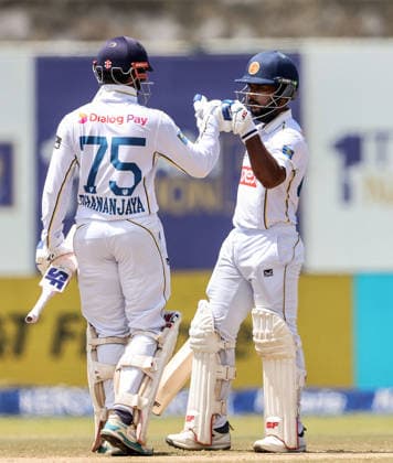IND vs SL: Day 5 of 1st Test Galle Sri Lanka , Aug 19 (ANI): Sri Lanka s captain Dhananjaya de Silva and Sonal Dinusha on the fifth day of the first test match between India and Sri Lanka at Galle International Stadium, in Galle on Wednesday. Galle Sri Lanka Copyright: xANIx ANI_20260819051