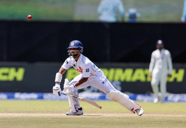 IND vs SL: Day 5 of 1st Test Galle Sri Lanka , Aug 19 (ANI): Sri Lanka s Sonal Dinusha plays a shot on the fifth day of the first test match between India and Sri Lanka at Galle International Stadium, in Galle on Wednesday. Galle Sri Lanka Copyright: xANIx ANI_20260819055