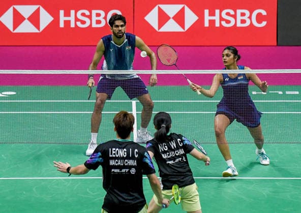 BWF World Championships 2026: India vs Macau New Delhi, Aug 19 (ANI): India s Dhruv Kapila and Tanisha Crasto in action against Macau s Leong Iok Chong and Weng Chi Ng during the mixed doubles match at the BWF World Championships 2026 at Indira Gandhi Indoor Stadium, in New Delhi on Wednesday. New Delhi Delhi India Copyright: xANIx ANI_20260819076