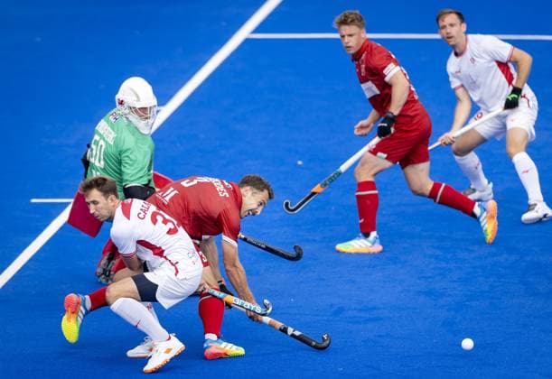 AMSTELVEEN - Will Calnan of England (L) in a duel with Daniel Kyriakides of Wales during the group stage match at the Hockey World Cup between England and Wales at the Wagener Stadium. KOEN VAN WEEL ANP xVIxANPxSportx xxANPxIVx 565811655 originalFilename: 565811655.jpg