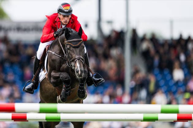260819 Daniel Deusser of Germany with horse Otello de Guldenboom compete in the team and individual jumping qualifier round one during day 9 of the 2026 FEI World Championships on August 19, 2026 in Aachen. Photo: Emma Wallskog BILDBYRAN kod EW EW0689 ridsport equestrian rid-vm 2026 2026 fei world championships bbeng ridsport-vm hoppning jumping *** August 19, 2026: Daniel Deusser of Germany, riding Otello de Guldenboom, competes in the first round of the team and individual show jumping qualifiers on day 9 of the 2026 FEI World Championships in Aachen on August 19, 2026 in Aachen. Photo by Emma Wallskog, BILDBYRAN, code EW EW0689. equestrian sports, 2026 World Championships, 2026 FEI World Championships, BBENG, equestrian World Championships, show jumping  Copyright: EMMAxWALLSKOG BB260819EW059