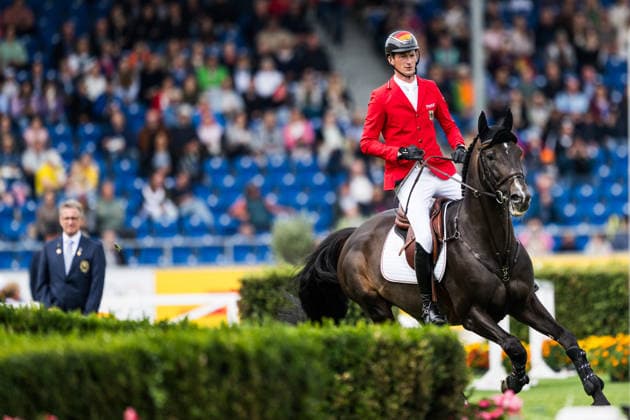 260819 Daniel Deusser of Germany with horse Otello de Guldenboom compete in the team and individual jumping qualifier round one during day 9 of the 2026 FEI World Championships on August 19, 2026 in Aachen. Photo: Emma Wallskog BILDBYRAN kod EW EW0689 ridsport equestrian rid-vm 2026 2026 fei world championships bbeng ridsport-vm hoppning jumping *** August 19, 2026: Daniel Deusser of Germany, riding Otello de Guldenboom, competes in the first round of the team and individual show jumping qualifiers on day 9 of the 2026 FEI World Championships in Aachen on August 19, 2026 in Aachen. Photo by Emma Wallskog, BILDBYRAN, code EW EW0689. equestrian sports, 2026 World Championships, 2026 FEI World Championships, BBENG, equestrian World Championships, show jumping  Copyright: EMMAxWALLSKOG BB260819EW060
