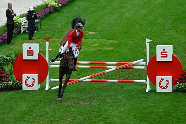 Aachen, Hauptstadion, 19.08.26, GER, FEI World Championships Aachen 2026, Turkish Airlines-Preis, Springreiten, First Competition Team & Individual Qualifier Bild: Richard VOGEL (Deutschland) mit United Touch S. Fehler am Sparkassen-Hindernis Nordrhein-Westfalen Deutschland *** Aachen, Main Stadium, August 26, 2019, GER, FEI World Championships Aachen 2026, Turkish Airlines Prize, Show Jumping, First Competition Team Individual Qualifier. Photo by Richard VOGEL. Germany with United Touch S. Fault at the Sparkassen obstacle. North Rhine-Westphalia, Germany