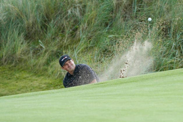 BALMEDIE, SCOTLAND - AUG 19: Patrick Reed (USA) plays from a green side bunker on the 1st hole during Practice at the 2026 Nexo Championship at the Trump International Golf Links, Balmedie on August 19, 2026 in Aberdeenshire, Scotland The 2026 Nexo Championship