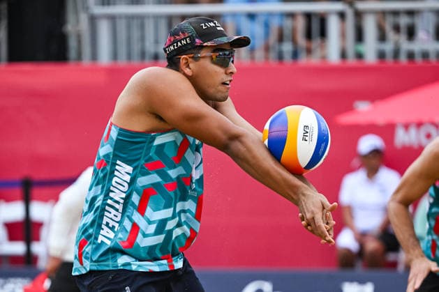 MONTREAL, QC - AUGUST 19: Renato Andrew Lima de Carvalho (BRA) bumps the ball during a qualification match at Beach Pro Tour Montreal Elite 16 on August 19, 2026 at Parc Jean-Drapeau in Montreal, QC (Photo by David Kirouac Icon Sportswire) VOLLEYBALL: AUG 19 Beach Pro Tour Montreal Elite 16 EDITORIAL USE ONLY Icon26081901026