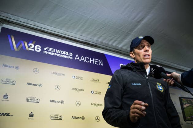 260819 Henrik von Eckermann of Sweden in mixed zone after competing in the team and individual jumping qualifier round one during day 9 of the 2026 FEI World Championships on August 19, 2026 in Aachen. Photo: Emma Wallskog BILDBYRAN kod EW EW0689 ridsport equestrian rid-vm 2026 2026 fei world championships bbeng ridsport-vm hoppning jumpingsverige sweden *** August 19, 2026: Henrik von Eckermann of Sweden in the mixed zone after competing in the first round of the team and individual show jumping qualifiers on Day 9 of the 2026 FEI World Championships on August 19, 2026 in Aachen. Photo by Emma Wallskog. BILDBYRAN code EW EW0689. equestrian sports, 2026 World Championships, 2026 FEI World Championships, BBENG, equestrian sports, World Championships, show jumping, Sweden  Copyright: EMMAxWALLSKOG BB260819EW128