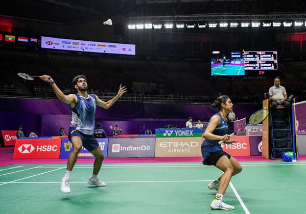 BWF World Championships 2026: India vs Macau New Delhi, Aug 19 (ANI): India s Dhruv Kapila and Tanisha Crasto in action against Macau s Leong Iok Chong and Weng Chi Ng during the mixed doubles match at the BWF World Championships 2026 at Indira Gandhi Indoor Stadium, in New Delhi on Wednesday. New Delhi Delhi India Copyright: xANIx ANI_20260819065