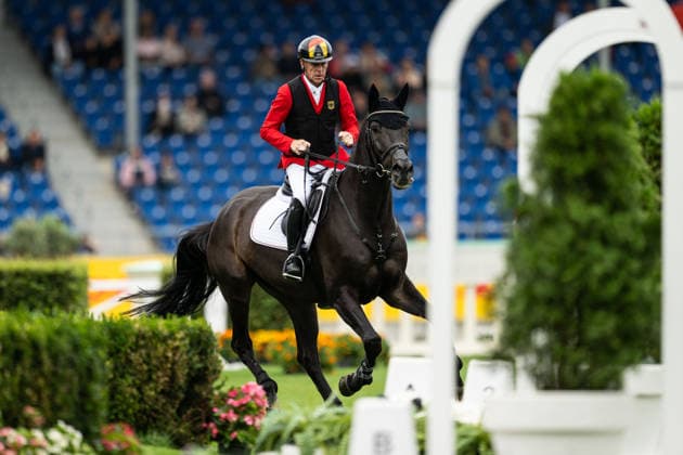 260819 Marcus Ehning of Germany with horse Coolio compete in the team and individual jumping qualifier round one during day 9 of the 2026 FEI World Championships on August 19, 2026 in Aachen. Photo: Emma Wallskog BILDBYRAN kod EW EW0689 ridsport equestrian rid-vm 2026 2026 fei world championships bbeng ridsport-vm hoppning jumping *** August 19, 2026: Marcus Ehning of Germany, riding Coolio, competes in the first round of the team and individual show jumping qualifiers on Day 9 of the 2026 FEI World Championships in Aachen. 2026 in Aachen. Photo by Emma Wallskog, BILDBYRAN, code EW EW0689. equestrian sports, 2026 World Championships, 2026 FEI World Championships, BBENG, equestrian sports, World Championships, show jumping  Copyright: EMMAxWALLSKOG BB260819EW139