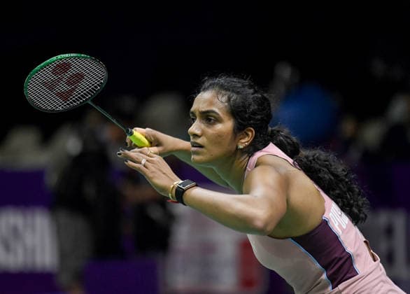 BWF World Championship, WM, Weltmeisterschaft 2026, India vs Canada, women s singles Round of 32 New Delhi, Aug 19 (ANI): India s PV Sindhu in action during the women s singles Round of 32 match against Canada™s Wen Yu Zhang at the BWF World Championship 2026 at Indira Gandhi Indoor Stadium, in New Delhi on Wednesday. NEW DELHI Delhi India Copyright: xANIx ANI_20260819509