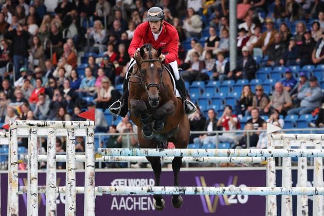 Richard Vogel (GER, Deutschland) mit Pferd Unites Touch S, aktueller Europameister und Sieger des Rolex Grand Prix von Aachen 2026 (CHIO Aachen) , Springen, FEI Jumping World Championship, WM, Weltmeisterschaft , Turkish Airlines-Prize, Einzel und Teamwertung, Jumping , AACHEN - FEI World Championships 2026, Weltfest des Pferdesports, Reitsport Weltmeisterschaft 2026, Aachen 2026, Welcome Home 2026, Aachener Soers, 11. bis 23. August 2026, Reitsport, 19.08.2026, Aachen Aachener Soers Deutschland *** Richard Vogel (GER), Germany, riding Unites Touch S, current European Champion and winner of the 2026 Rolex Grand Prix at CHIO Aachen, show jumping, FEI Jumping World Championship, Turkish Airlines Prize, individual and team competitions, show jumping, AACHEN FEI World Championships 2026, World Equestrian Festival, 2026 World Equestrian Championships, Aachen 2026, Welcome Home 2026, Aachen Soers, August 11–23, 2026, Equestrian Sports, August 19, 2026, Aachen Soers, Germany