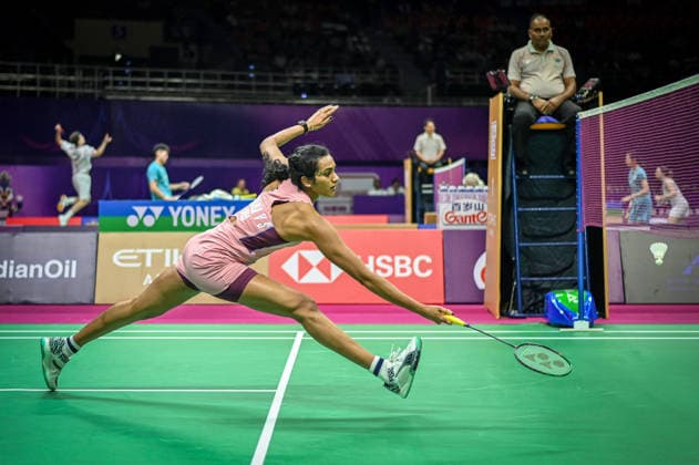 NEW DELHI, INDIA - AUGUST 19: India™s Pusarla V. Sindhu returns a shot against Canada™s Wen Yu Zhang during their women™s singles Round of 32 match on day three of the BWF World Championships 2026 at the Indira Gandhi Indoor Stadium on August 19, 2026 in New Delhi, India. (Photo by Sanchit Khanna Hindustan Times) BWF World Championships 2026