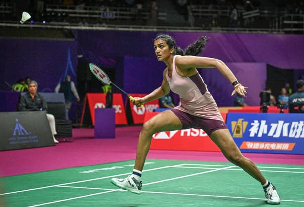 NEW DELHI, INDIA - AUGUST 19: India™s Pusarla V. Sindhu returns a shot against Canada™s Wen Yu Zhang during their women™s singles Round of 32 match on day three of the BWF World Championships 2026 at the Indira Gandhi Indoor Stadium on August 19, 2026 in New Delhi, India. (Photo by Sanchit Khanna Hindustan Times) BWF World Championships 2026