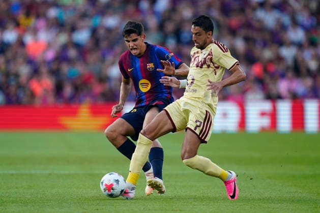 ESP: FC Barcelona, Barca - Al Ahly FC. Joan Gamper Trophy. Gerard Martin of FC Barcelona and Taher Mohamed of Al Ahly during the Joan Gamper Trophy match between FC Barcelona and Al Ahly FC played at Spotify Camp Nou Stadium on 19 Aug 2026 in Barcelona, Spain. kpng Copyright: xSergioxRuizx xPRESSINPHOTOx PS_2627_BAR_AHL_007