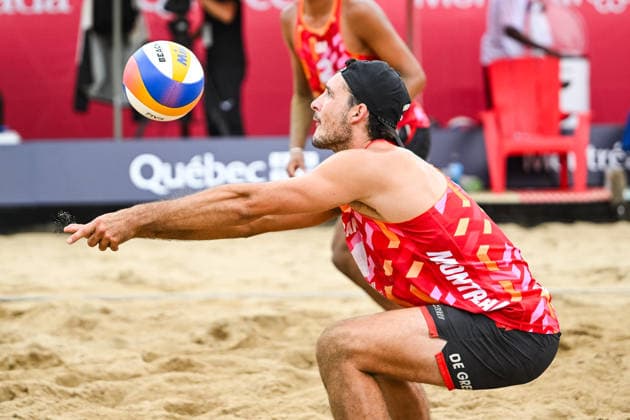 MONTREAL, QC - AUGUST 19: Luke de Greeff (CAN) bumps the ball during a qualification match at Beach Pro Tour Montreal Elite 16 on August 19, 2026 at Parc Jean-Drapeau in Montreal, QC (Photo by David Kirouac Icon Sportswire) VOLLEYBALL: AUG 19 Beach Pro Tour Montreal Elite 16 EDITORIAL USE ONLY Icon26081901526