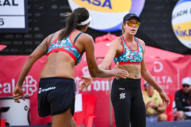 MONTREAL, QC - AUGUST 19: Ana Patricia Silva Ramos (BRA) and Carolina Horta Maximo (BRA) react after scoring a point during a qualification match at Beach Pro Tour Montreal Elite 16 on August 19, 2026 at Parc Jean-Drapeau in Montreal, QC (Photo by David Kirouac Icon Sportswire) VOLLEYBALL: AUG 19 Beach Pro Tour Montreal Elite 16 EDITORIAL USE ONLY Icon26081902026