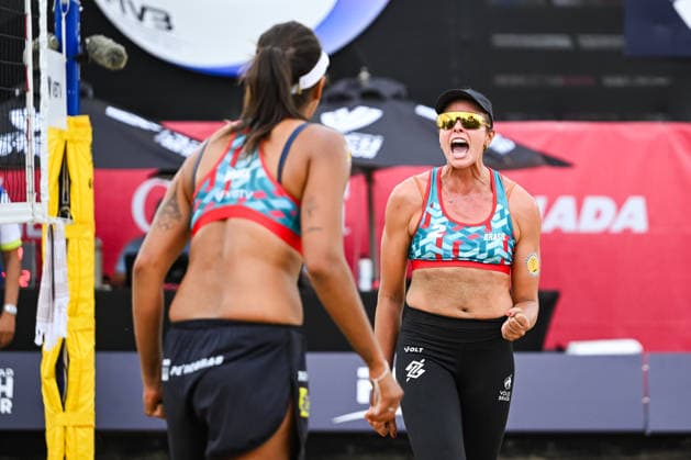 MONTREAL, QC - AUGUST 19: Ana Patricia Silva Ramos (BRA) and Carolina Horta Maximo (BRA) react after scoring a point during a qualification match at Beach Pro Tour Montreal Elite 16 on August 19, 2026 at Parc Jean-Drapeau in Montreal, QC (Photo by David Kirouac Icon Sportswire) VOLLEYBALL: AUG 19 Beach Pro Tour Montreal Elite 16 EDITORIAL USE ONLY Icon26081902726