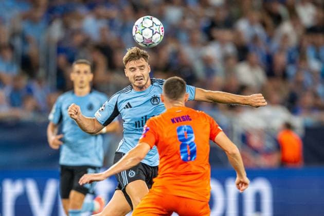 Peter Pokorny in a header battle during Champions League qualifying playoff match, SK Slovan Bratislava - NK Celje , 19. august 2026, Tehelne pole Stadium, Bratislava, Slovakia Copyright: xMICHALxFAJT,ZOSPORTU.SKx MAR_8229