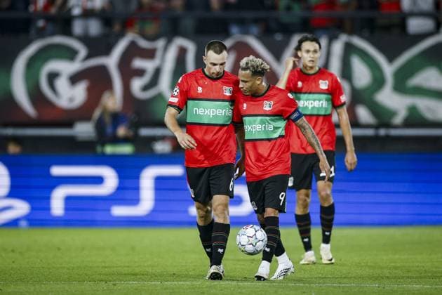 NIJMEGEN - (lr) Darko NejaÅ¡miÄ‡ of NEC Nijmegen and Tjaronn Chery of NEC Nijmegen react after the 0-1 during the Champions League play-offs between NEC and FK Bodo Glimt at De Goffert on August 18, 2026 in Nijmegen, the Netherlands. BART STOUTJESDIJK ANP xVIxANPxSportx xxANPxIVx 565831899 originalFilename: 565831899.jpg