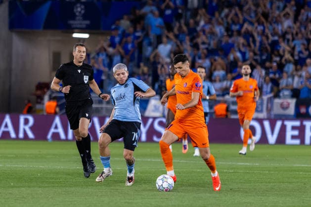 Cristian Martinez of SK Slovan Bratislava and Milot Avdyli of Celje seen during UEFA Champions league first play-off game between teams of SK Slovan Bratislava and Celje (Dominika Kortvelyesiova Ball Raw Images) Bratislava Tehelne Pole stadium Slovakia Copyright: xDominikaxKortvelyesiovax DKR_6014