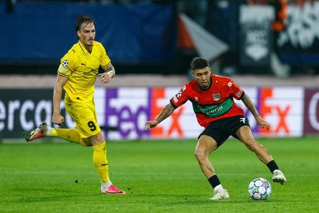 NIJMEGEN , 19-08-2026 , Stadium De Goffert , season 2026 2027 , UEFA Champions League play-offs 1st leg football , match between NEC Nijmegen and Bodo Glimt , picture shows Bodo Glimt player Andreas Helmersen and NEC player Emre Mor NEC - Bodo Glimt  x205854552x Copyright: