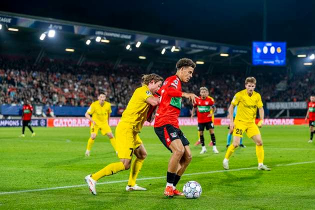 NIJMEGEN - FC Bodo Glimt middenvelder Patrick Berg en N.E.C. Nijmegen aanvaller Clement Bischoff tijdens de UEFA Champions League wedstrijd tussen N.E.C. en FC Bodo Glimt in Gofferpark op 19 augustus 2026 in Nijmegen, Nederland. - *** NIJMEGEN FC Bodo Glimt midfielder Patrick Berg and NEC Nijmegen forward Clement Bischoff during the UEFA Champions League match between NEC and FC Bodo Glimt at Gofferpark on August 19, 2026, in Nijmegen, the Netherlands