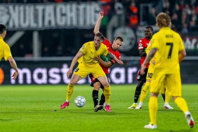 NIJMEGEN - L-R FC Bodo Glimt aanvaller Andreas Helmersen en N.E.C. Nijmegen middenvelder Darko Nejasmic tijdens de UEFA Champions League wedstrijd tussen N.E.C. en FC Bodo Glimt in Gofferpark op 19 augustus 2026 in Nijmegen, Nederland. - *** NIJMEGEN: FC Bodo Glimt forward Andreas Helmersen and NEC Nijmegen midfielder Darko Nejasmic during the UEFA Champions League match between NEC and FC Bodo Glimt at Gofferpark on August 19, 2026, in Nijmegen, the Netherlands