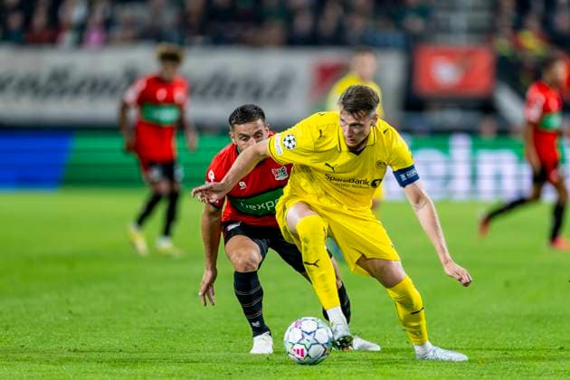 NIJMEGEN - L-R N.E.C. Nijmegen aanvaller Dusan Tadic en FC Bodo Glimt verdediger Odin Bjortuft tijdens de UEFA Champions League wedstrijd tussen N.E.C. en FC Bodo Glimt in Gofferpark op 19 augustus 2026 in Nijmegen, Nederland. - *** NIJMEGEN L R N E C Nijmegen forward Dusan Tadic and FC Bodo Glimt defender Odin Bjortuft during the UEFA Champions League match between N E C and FC Bodo Glimt at Gofferpark on August 19, 2026, in Nijmegen, the Netherlands