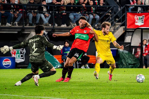 2026-08-19 NEC Nijmegen v FK Bodo Glimt - UEFA Champions League 2026 27 Play-Offs First Leg NIJMEGEN, NETHERLANDS - AUGUST 19: goalkeeper Gonzalo Crettaz of NEC Nijmegen, Deveron Fonville of NEC Nijmegen, Ole Didrik Blomberg of FK Bodo Glimt battle for the ball during the UEFA Champions League 2026 27 Play-Offs First Leg match between NEC Nijmegen and FK Bodo Glimt at Goffertstadium on August 19, 2026 in Nijmegen, Netherlands. (Photo by Gabriel Calvino Alonso BSR Agency) Nijmegen Netherlands Content not available for redistribution in The Netherlands directly or indirectly through any third parties. Copyright: xBSRxAgencyx