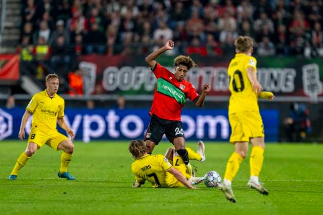 NIJMEGEN - N.E.C. Nijmegen verdediger Deveron Fonville en FC Bodo Glimt middenvelder Patrick Berg tijdens de UEFA Champions League wedstrijd tussen N.E.C. en FC Bodo Glimt in Gofferpark op 19 augustus 2026 in Nijmegen, Nederland. - *** NIJMEGEN N E C Nijmegen defender Deveron Fonville and FC Bodo Glimt midfielder Patrick Berg during the UEFA Champions League match between N E C and FC Bodo Glimt at Gofferpark on August 19, 2026, in Nijmegen, the Netherlands