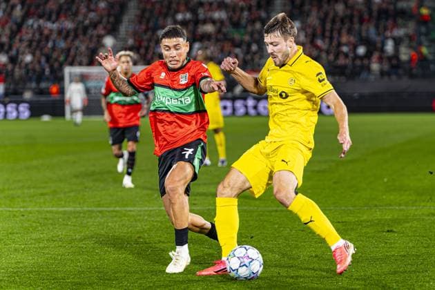 NIJMEGEN - Fredrik Andre Bjorkan of FK Bodo Glimt battles for possession with Emre Mor of NEC Nijmegen during the UEFA Champions League Play-offs match between NEC Nijmegen and FK Bodo Glimt at the Goffertstadion on 19 August 2026 in Nijmegen, the Netherlands. KEVIN SENDERS ANP xVIxANPxSportx xMarcelxterxBalsxIVx 565833936 originalFilename: 565833936.jpg