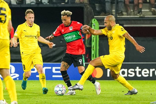 2026-08-19 NEC Nijmegen v Bodo Glimt - UEFA Champions League Play-offs - 1st leg NIJMEGEN, NETHERLANDS - AUGUST 19: Tjaronn Chery of N.E.C. Nijmegen, Haitam Aleesami of FK Bodo Glimt during the UEFA Champions League Play-offs - 1st leg match between NEC Nijmegen and Bodo Glimt at Goffertstadion on August 19, 2026 in Nijmegen, Netherlands. Nijmegen Goffertstadion Netherlands Content not available for redistribution in The Netherlands directly or indirectly through any third parties. Copyright: xAndrexWeeningx