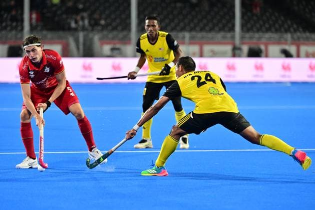 RECORD DATE NOT STATED Belgium s Arno Van Dessel and Malaysia s Aiman Rozemi pictured during a hockey game between Belgian Lions and Malaysia, the third (out of three) matches during the group stage of the men s 2026 Hockey World Cup, Saturday 30 December 1899 in Wavre. The 2026 edition of the Hockey World Cup takes place in Belgium and The Netherlands from August 15 to August 30. DIRKxWAEM  x183792847x